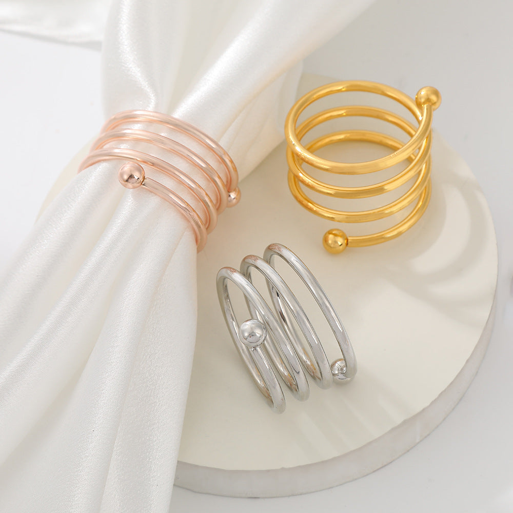 4 Pc Plated Spiral Aluminum Napkin Rings Rose Gold
